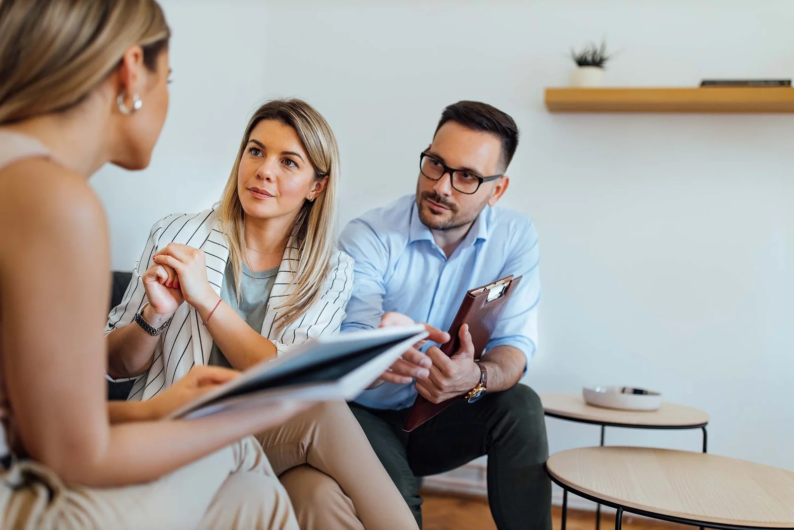 team-of-lawyers-listening-to-a-client-portrait-CSUC9DZ